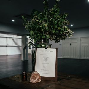 A calm, empty yoga space with natural light.